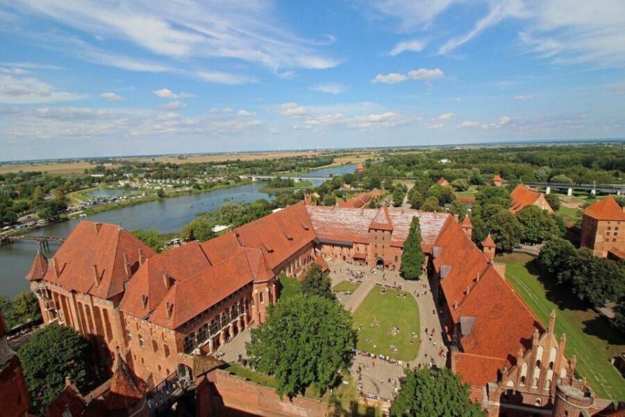 From Gdansk: Malbork Castle Trip with Ticket and Audio Guide - Gdańsk hotel pickup and the hour-long ride that sets the tone